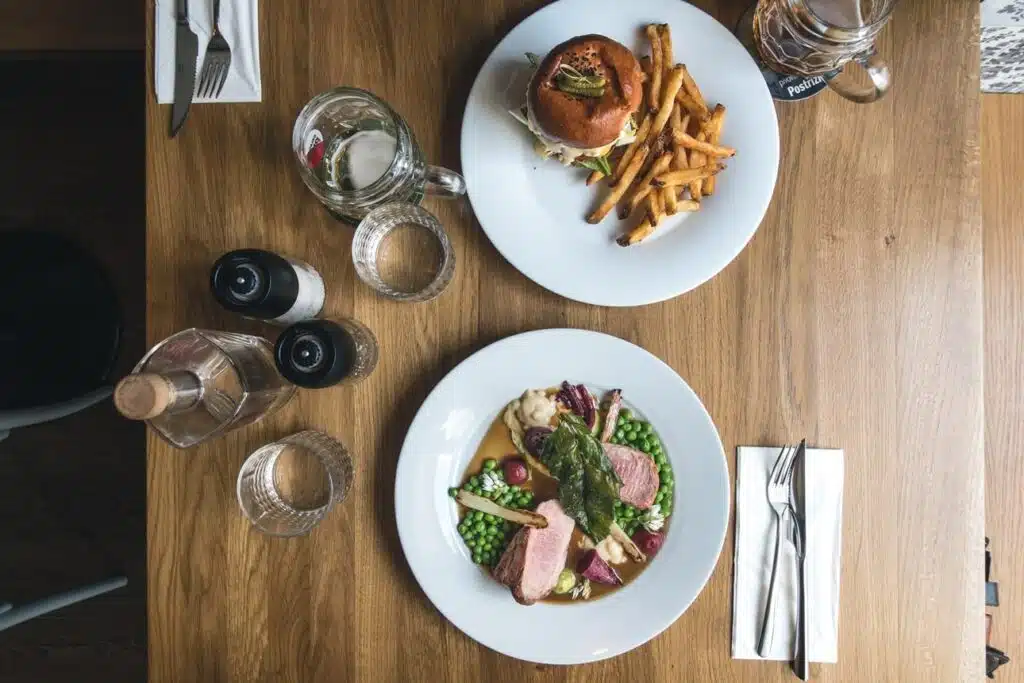 a table set for dining with two plates of food